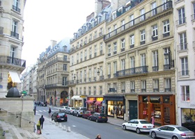 Luxury shopping street Rue Saint Honore in Paris. Famous brands