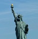 statue of the liberty in paris logo